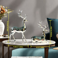 Pair of silver-plated reindeers